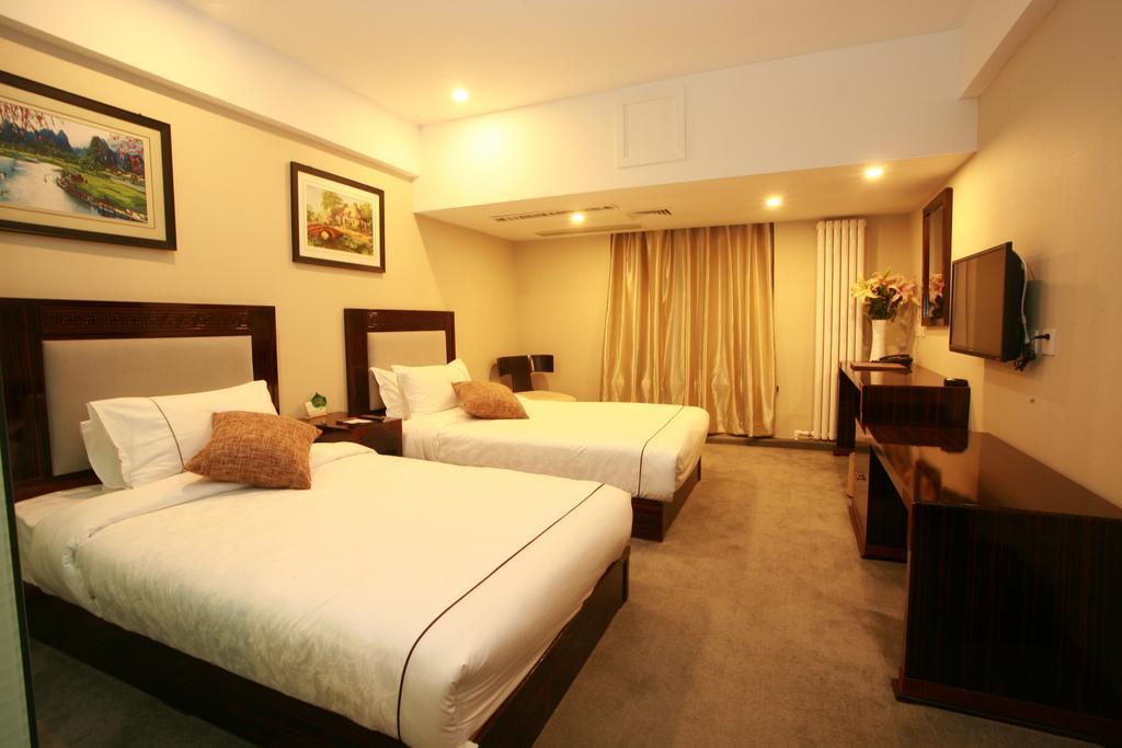 Harbin Yakelai Holiday Hotel Room photo