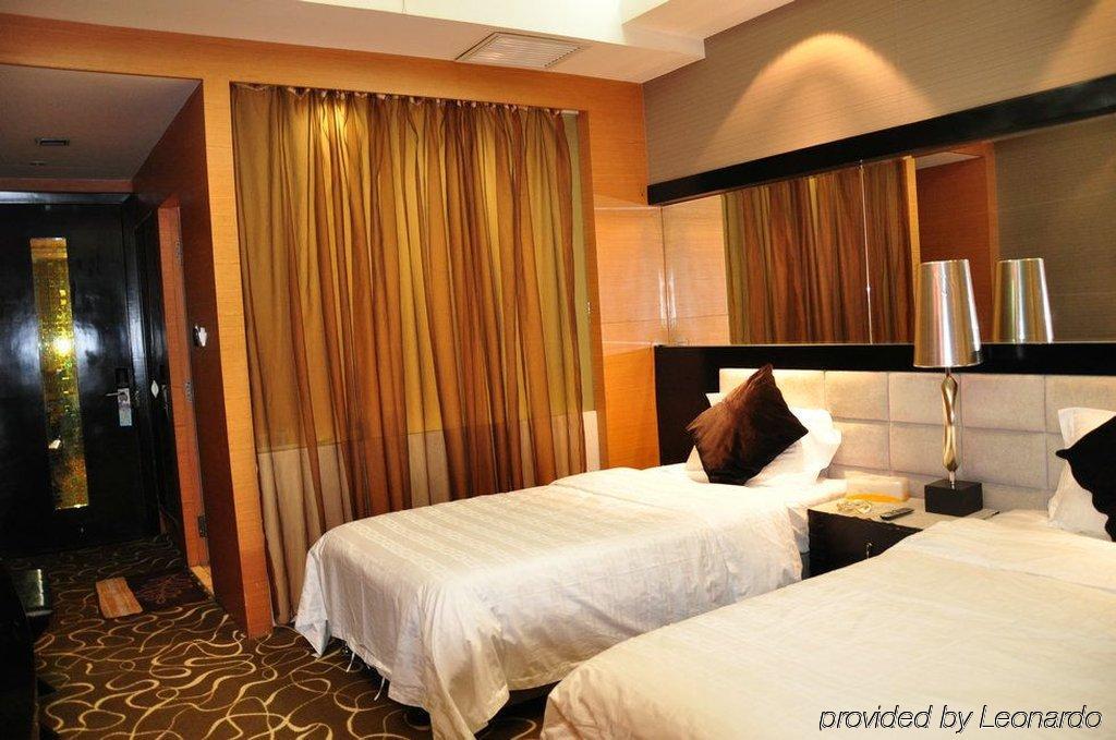 Harbin Yakelai Holiday Hotel Room photo