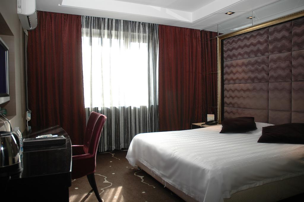 Harbin Yakelai Holiday Hotel Room photo