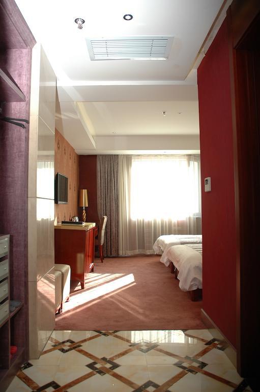Harbin Yakelai Holiday Hotel Room photo