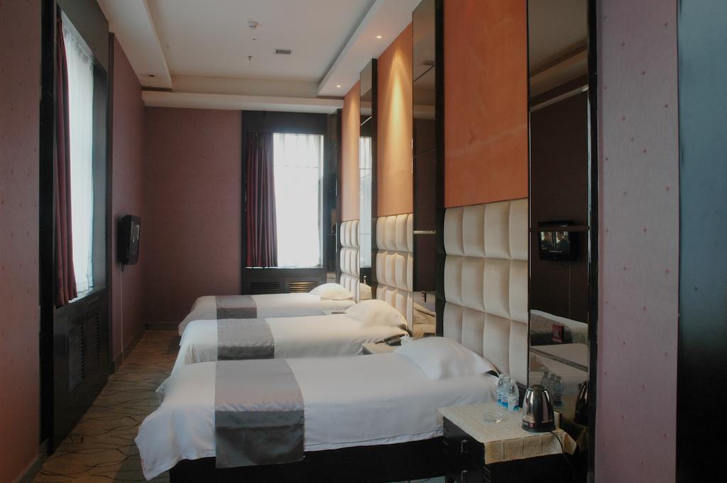Harbin Yakelai Holiday Hotel Room photo