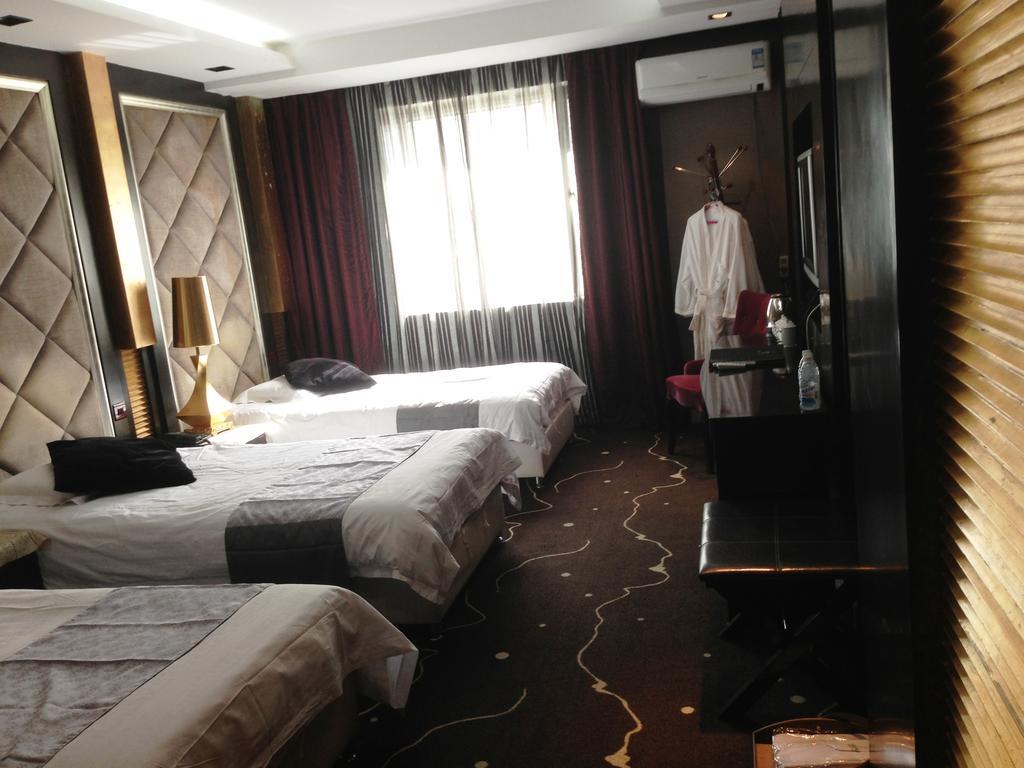 Harbin Yakelai Holiday Hotel Room photo