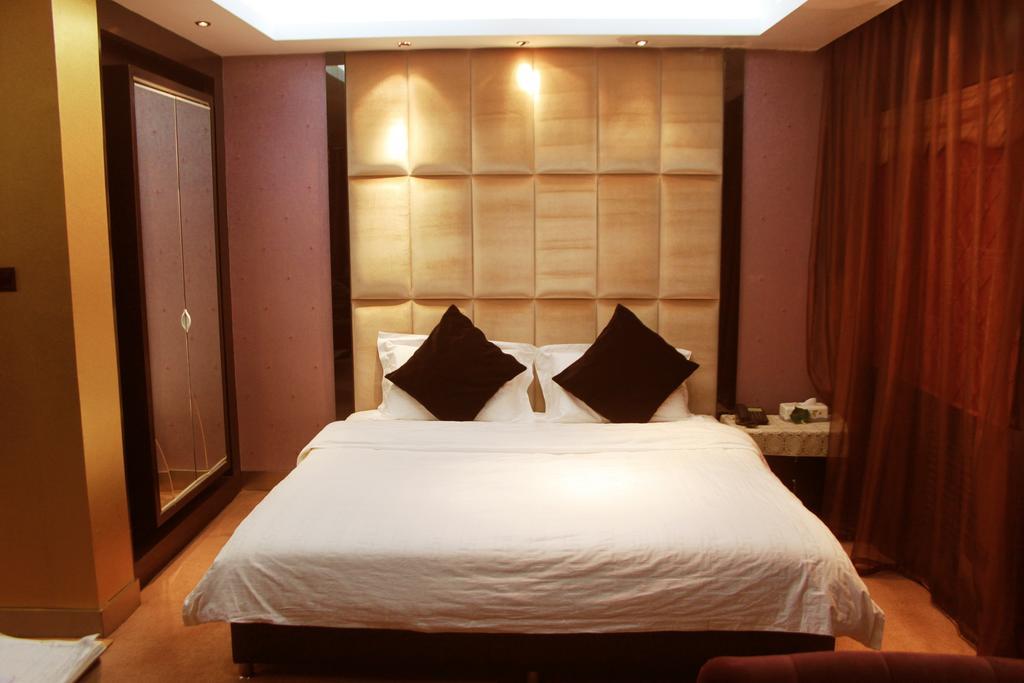 Harbin Yakelai Holiday Hotel Room photo