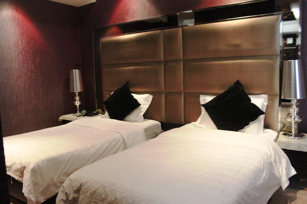 Harbin Yakelai Holiday Hotel Room photo